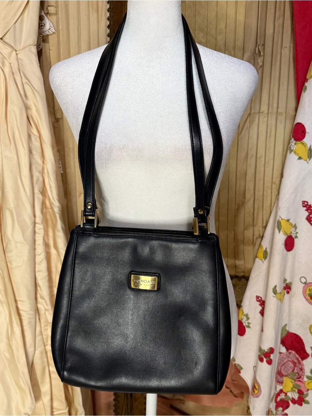 Mondani Black Leather Shoulder Bag with Gold Plaque